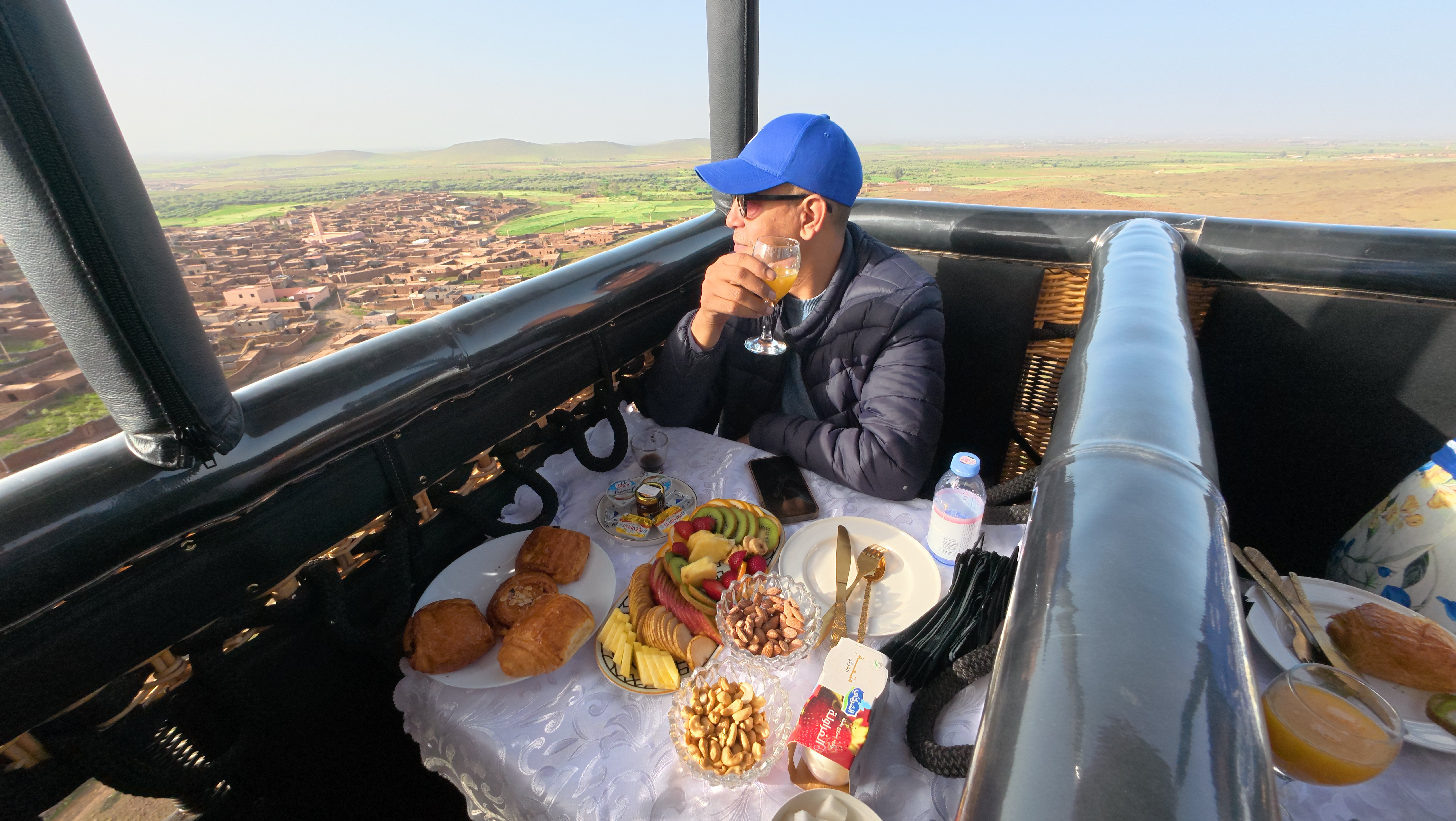 Breakfast in a hot-air balloon basket over Marrakech